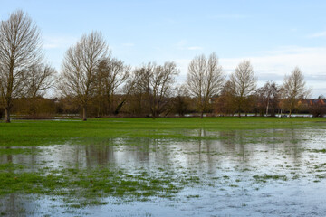 Flood water in a public park after the river banks burst from heavy rain