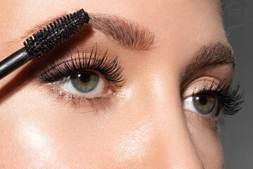 Close-up of make-up blue eye with long lashes with black mascara