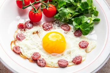 fried egg sausages, vegetable breakfast fresh meal food snack on the table copy space food background rustic top view