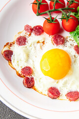 fried egg sausages, vegetable breakfast fresh meal food snack on the table copy space food background rustic top view