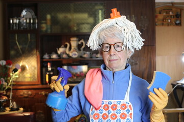 Hilarious senior woman man wearing mop hair while doing chores 