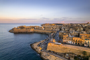 Fototapeta na wymiar Valletta, Malta aerial drone view at old town at sunset
