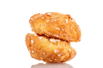 Two sweet chouquette, close-up, isolated on white.