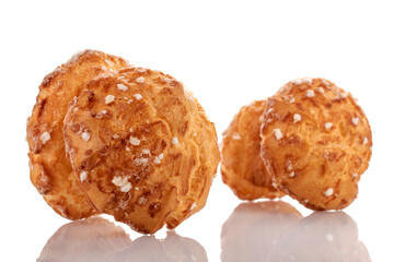 Several sweet chouquette , close-up, isolated on white.