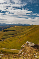A winding mountain road to the Djily Su tract with beautiful views of the Elbrus peaks.