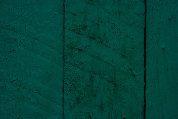 Green painted wooden planks wall