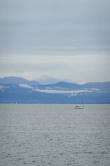 Panorama of Bodensee lake and a yacht, the view from Romanshorn, Switzerland