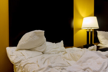 Lamp in modern interior hotel room with comfort bedroom