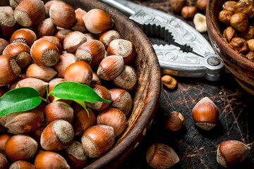Hazelnuts with Nutcracker on the old Board .