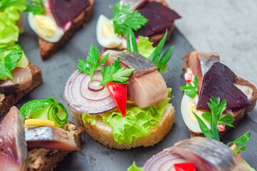Appetizer with salted herring.