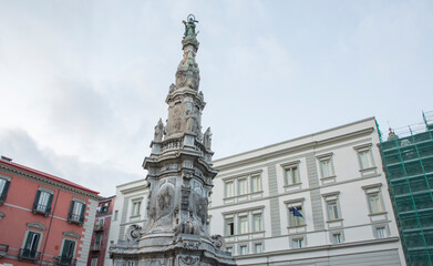 Obraz premium Closeup of obelisk Guglia of the Immaculate Virgin in the center of Piazza Gesù Nuovo located in Naples, Italy