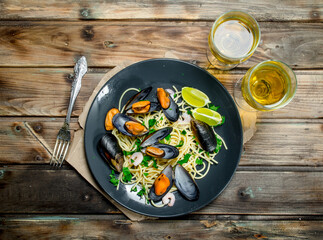Mediterranean food. Seafood spaghetti with clams and white wine.