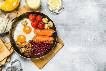 English breakfast. A variety of snacks with orange juice.