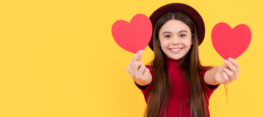 cheerful kid with love romantic gift. sweetheart. valentines sale. Kid girl portrait with heart love symbol, horizontal poster. Banner header with copy space.