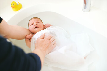 The first time bath for newborn baby in hospital