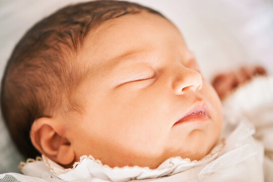Close up portrait of adorable sleeping newborn baby