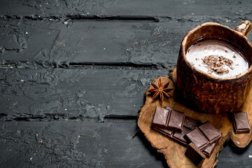 Hot chocolate with cinnamon sticks.