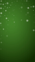 Magic falling snow christmas background. Subtle flying snow flakes and stars on christmas green background. Magic falling snow holiday scenery.   Vertical vector illustration.