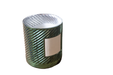 Cylindrical green candle holder with white candle and blank lable as an isolated object