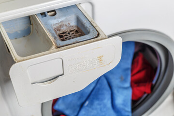 Washing machine.Dirty moldy washing machine detergent and fabric conditioner dispenser drawer...