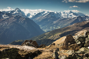 view from mohar towards the Grossglockner massive and the valley flor on a beautiful summer day.