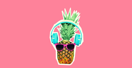 Close up of funny pineapple listening to music in headphones on pink background, magazine style