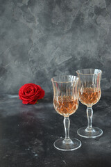 Valentine background with wine, roses and beautiful gift