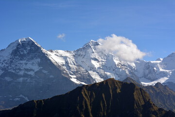 Snow-covered peaks of the Alps in Switzerland. Jungfrau. Schynige Platte