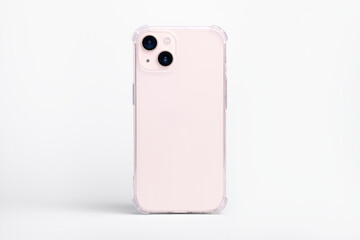 Pink iPhone 13 in clear transparent soft silicone case back view. Phone case mockup isolated on gray background