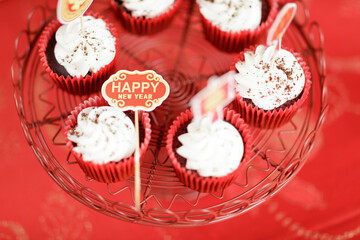 happy new year label on the cupcake