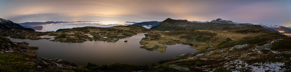 Panoramic view of lake in mountain by night