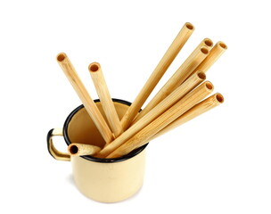 Bamboo straws isoalted on white background. Drinking straws from bamboo wood for reusing and reducing the use of plastic straw. Brown disposable drinking straws, eco-friendly cocktail tubes.