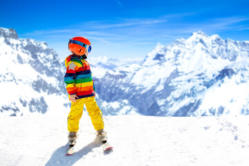 Kids winter snow sport. Children ski. Family skiing. - obrazy, fototapety, plakaty