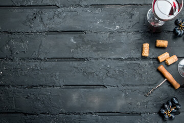 Red wine with corkscrew.