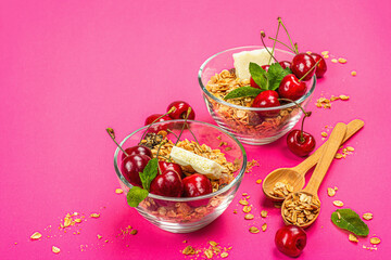 Summer breakfast concept. Healthy morning food. Ripe cherries, milk, white chocolate, and granola