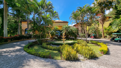 Panama Boquete, tropical gardens with fountain at the entrance to the spa