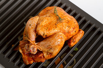 Pollo adobado en parrilla