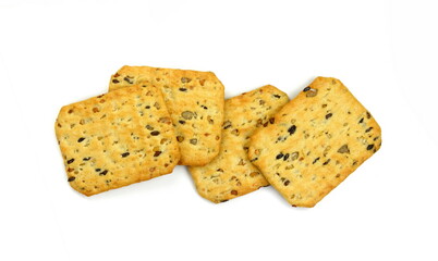 Top view of a group multigrain flatbread crackers isolated on a white background.