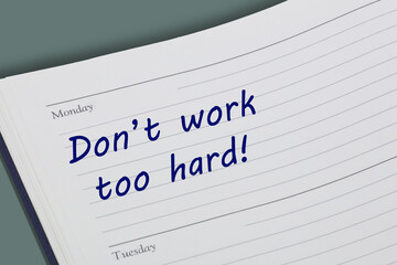 Dont work too hard advice note in a diary page