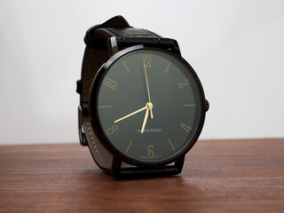 Water resistant black watch with leather strap