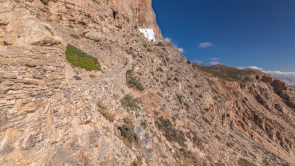 The Hozoviotissa Monastery standing on a rock over the Aegean sea in Amorgos island timelapse...