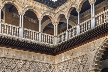 Obraz premium The Royal Alcazar of Seville - group of 14th century royal palaces. The palaces showcase a mix of Moorish, Renaissance and Mudejar architecture. Seville, Andalusia, Spain. 