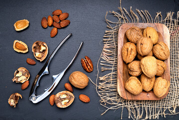Walnut and nutcracker closeup. View from above.