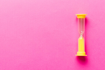 hourglass on the table, sand clock as time passing concept for business deadline, copy space