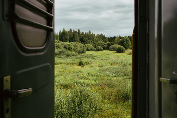 a view from an old trains doors © Andris