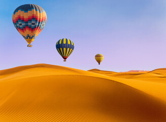 Desert and hot air balloon Landscape at Sunrise. Travel, inspiration, success, dream, flight concept