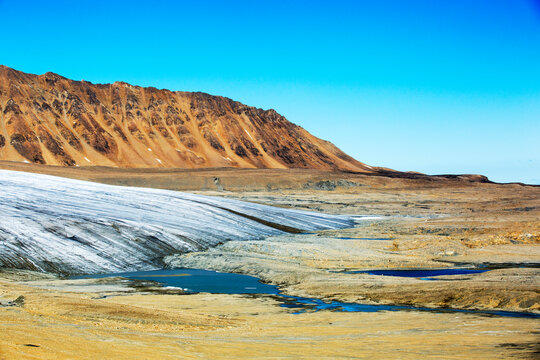 Scenic view of receding glacier,&acirc;&euro;&nbsp;Recherchefjorden, Spitsbergen, Svalbard