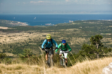 two mountain bikers on the way, Slatnik, Istria, Slovenia