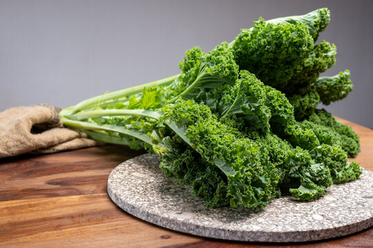 Leaves of winter vegetable green kale cabbage close up