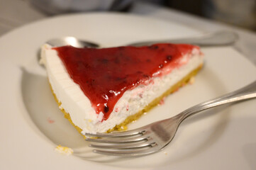 Traditional Portuguese cake with cream, fruits and cookies